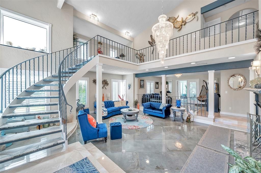 Step inside to the foyer area and formal living room with soaring ceiling