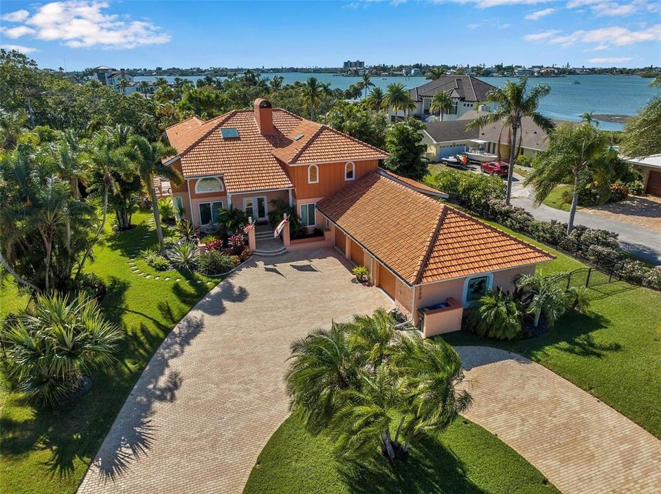 A modern mediterranean beauty surrounded by beautiful tropical landscape