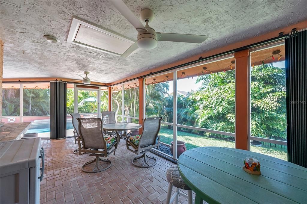 Although the home has impact rated windows the lanai features accordian shutters for added peace of mind