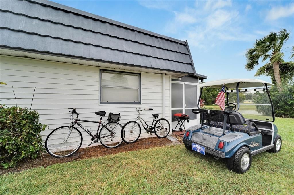 The golf cart, bicycles and grill stay with the home