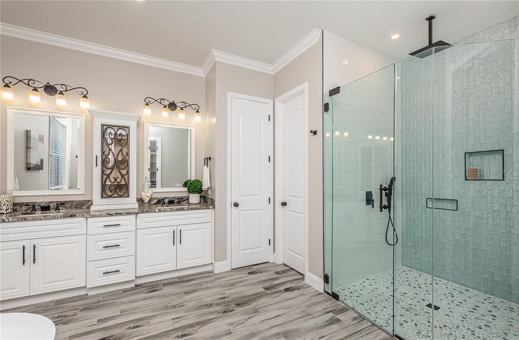 walk-in shower with glass tile