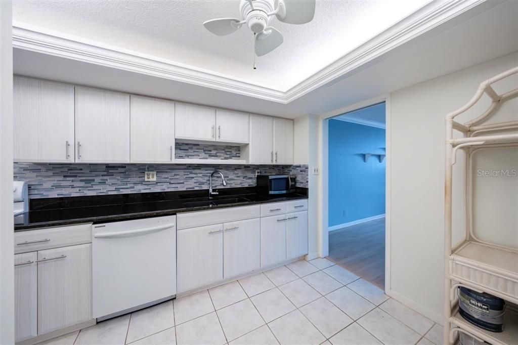 Kitchen with tile floor.