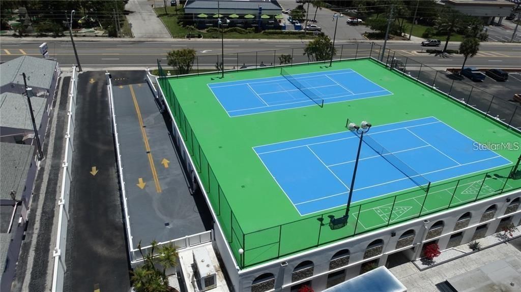 Two private lighted tennis courts