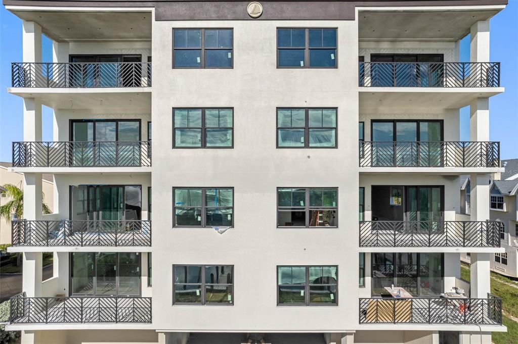 Intricate Herringbone railing accentuates the building's design.