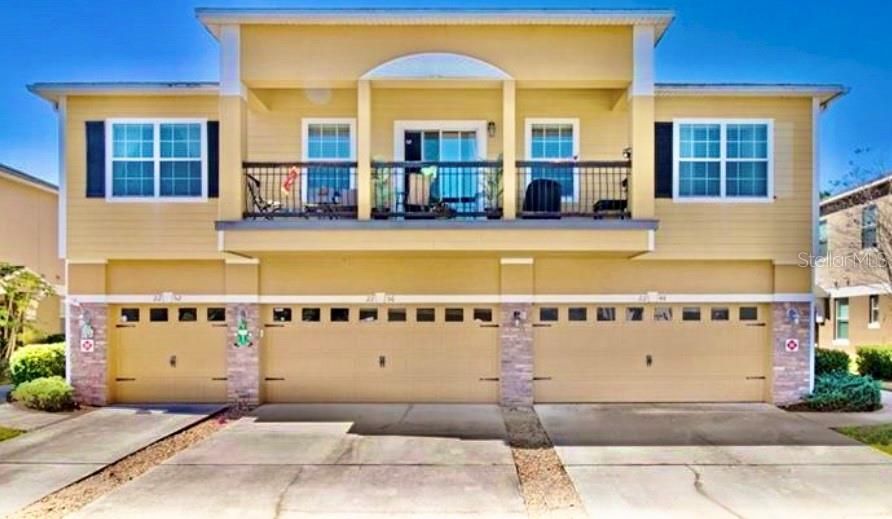 2-STORY CONDO with 2-CAR GARAGE