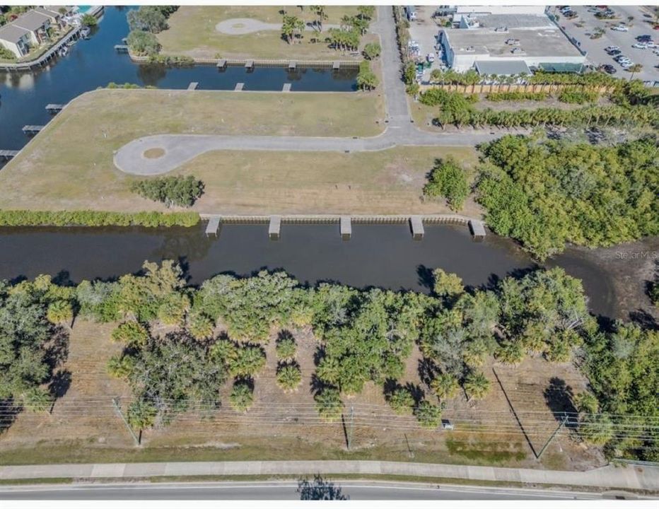Aerial looking at property along canal