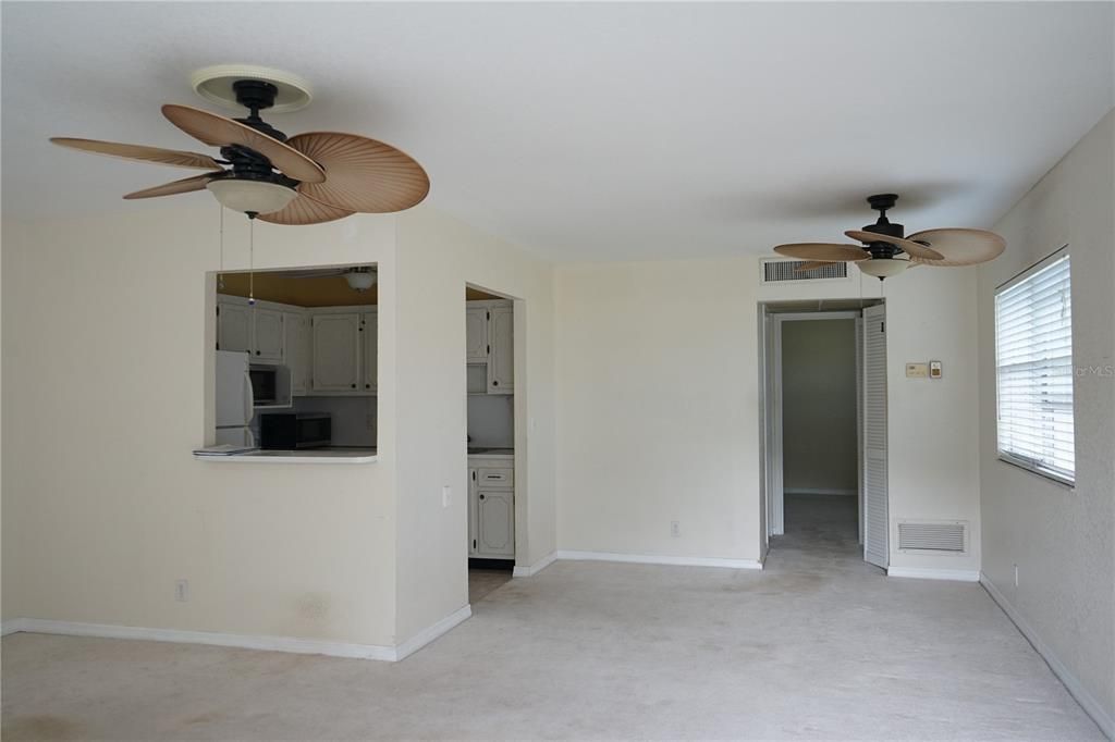 dining area to the right with kitchen at the left