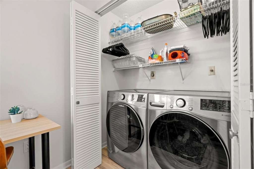 Kitchen with water views, large pantries, and washer and dryer closet