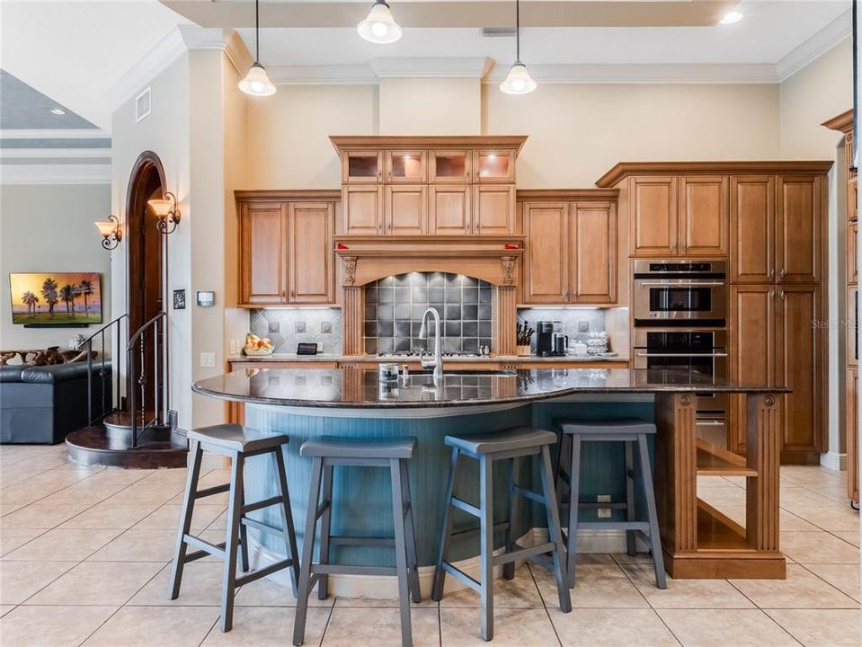 Large open kitchen with 42 inch wood cabinetry