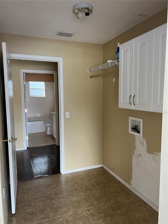 Garage Entrance into Laundry Room