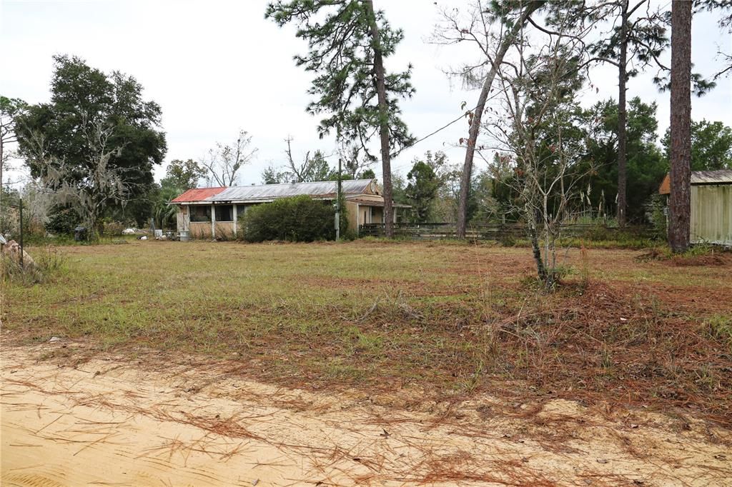 Front of property, first house on left, second house to the right.