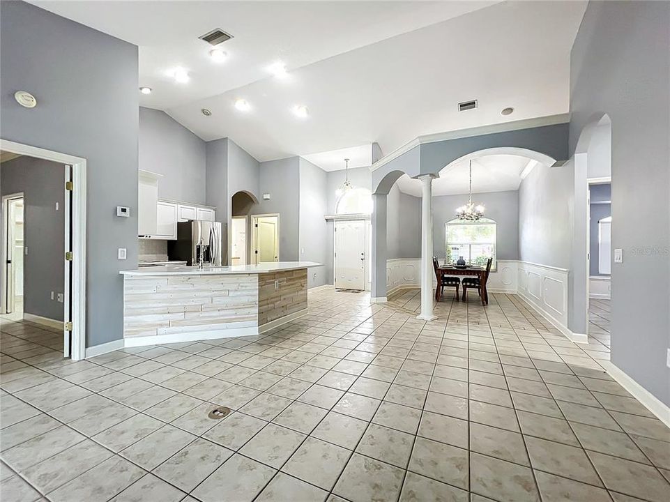 View from the living room into the kitchen and dining room