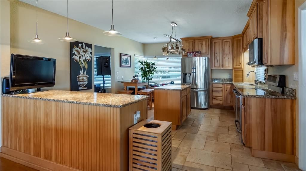 Corner Dinette in Kitchen remodeled 2008ish, hickory cabinets and granite counters