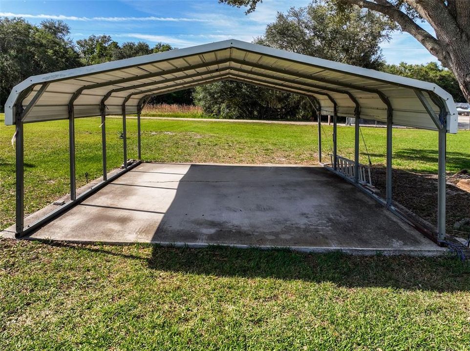 DOUBLE CARPORT IN BACK OF HOME
