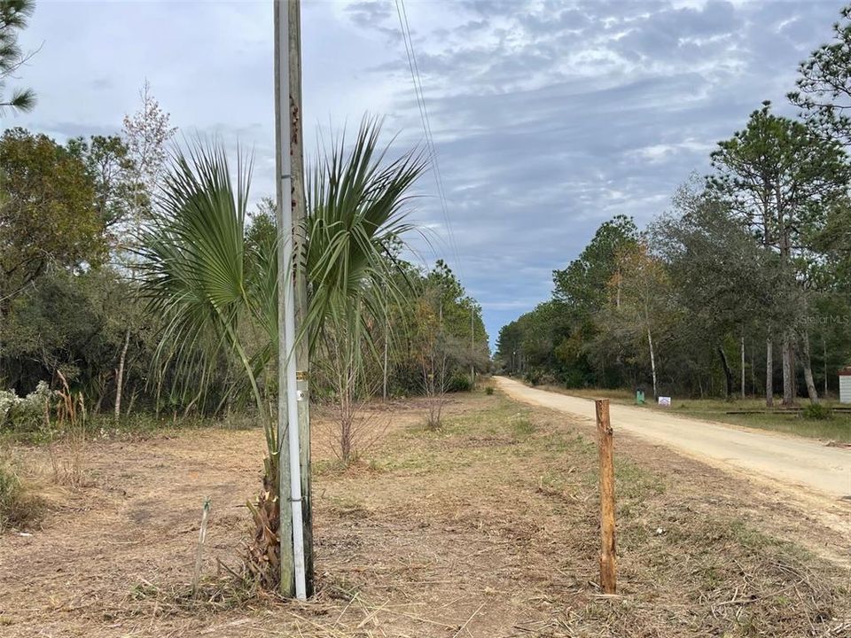 Posts have been added to each front corner of the property for easy visual of property frontage.