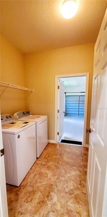 Utility room which includes a washer and dryer