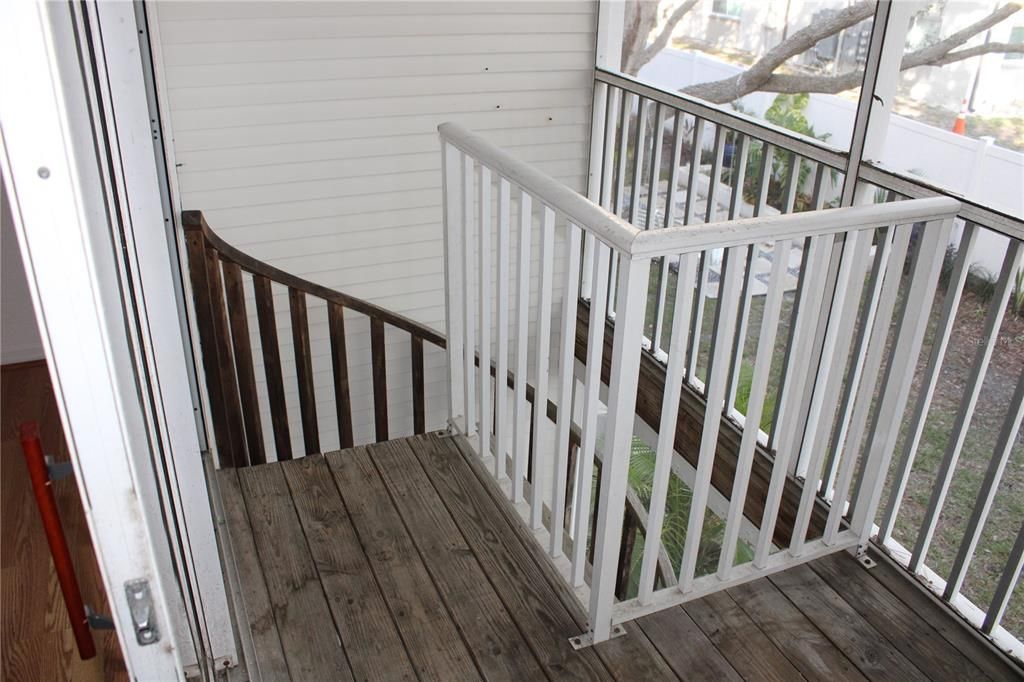 spiral staircase from main floor balcony