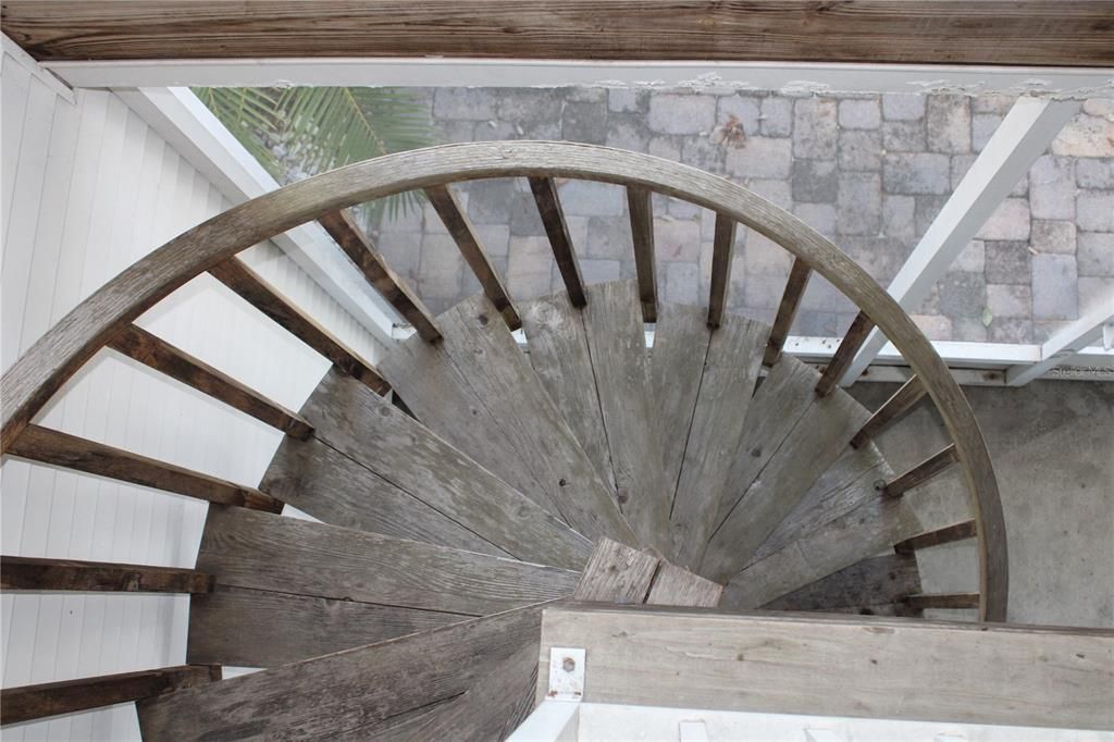 spiral staircase from main floor balcony