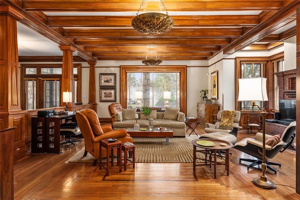 Original details fill the interiors with fireplaces, Oak and Heart Pine floors, and Sweet Gum paneling and trim