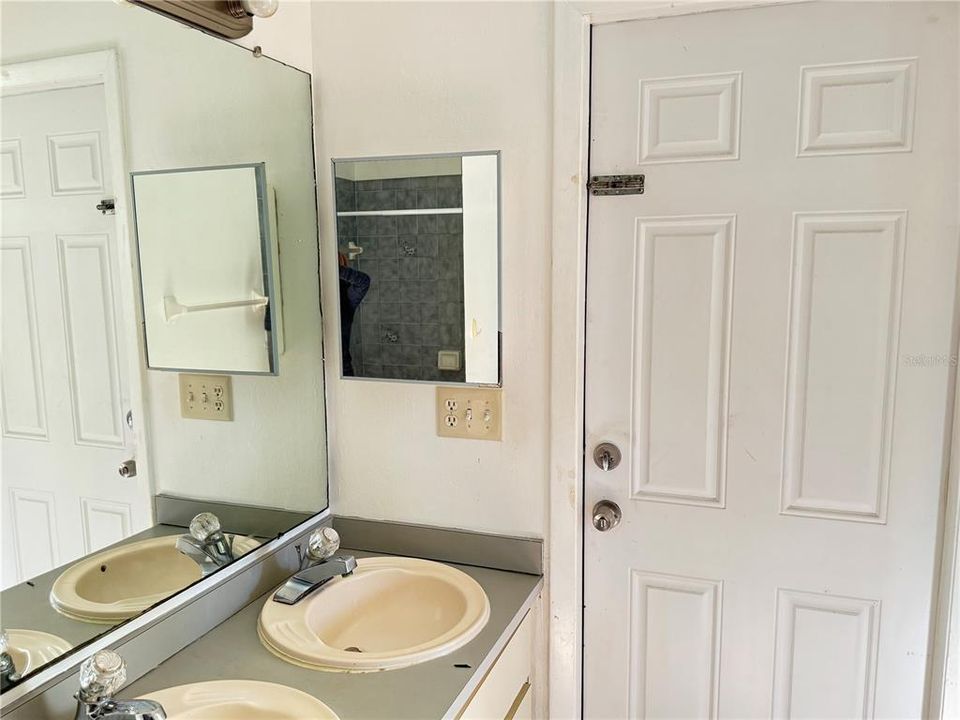 Double sinks in master bathroom Door to the outside