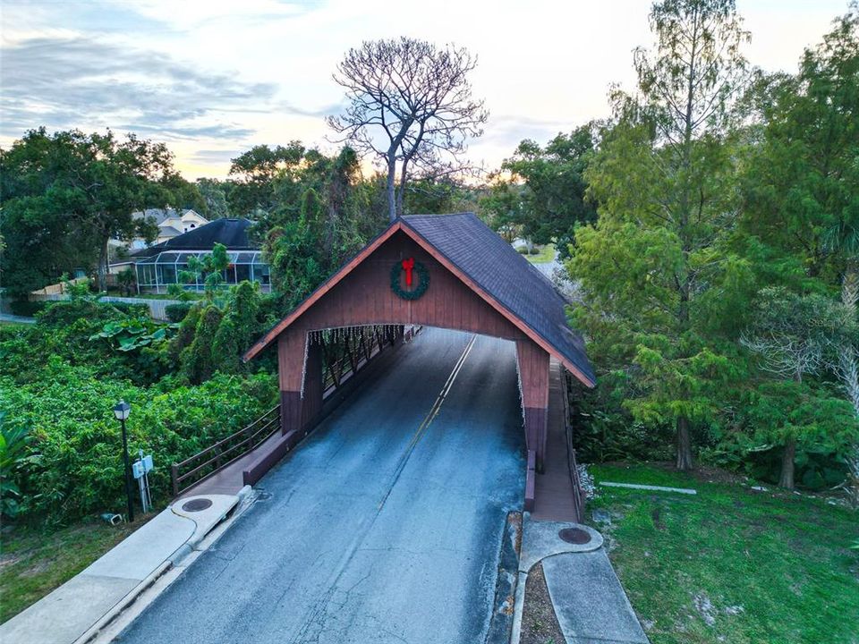 Charming covered bridge as you enter Country Creek!