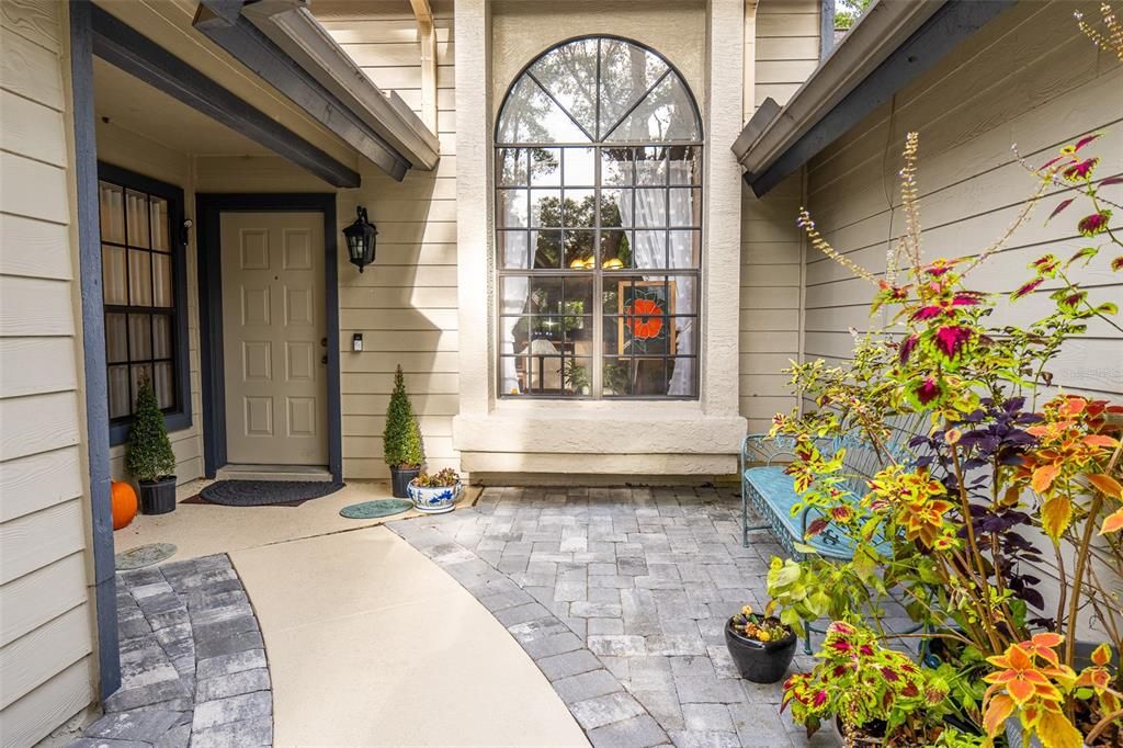Lovely entrance with additional pavers to expand usable space!