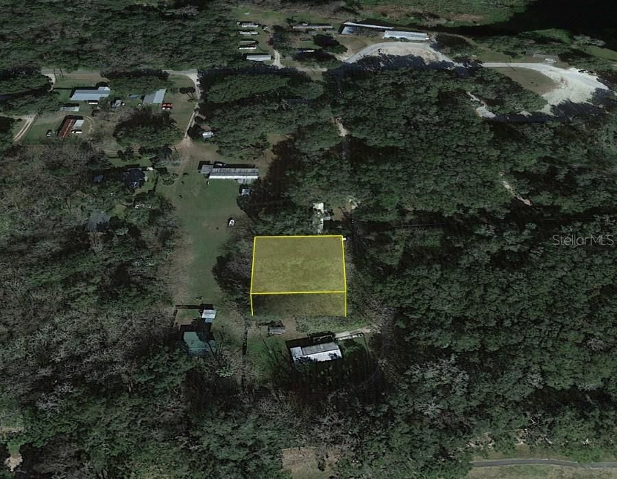 Active With Contract: $13,000 (0.26 acres)
