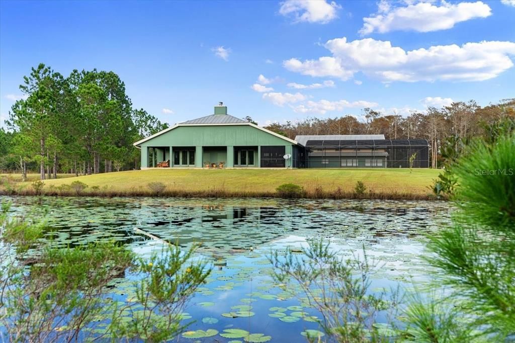 Side view of home from across pond