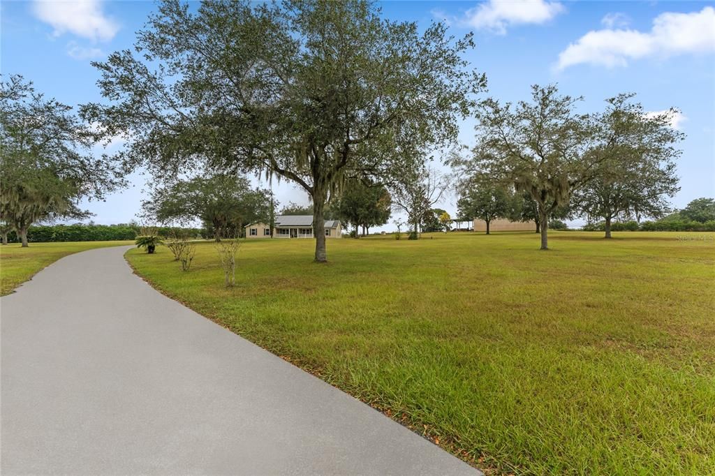 Nice long extended driveway up to home