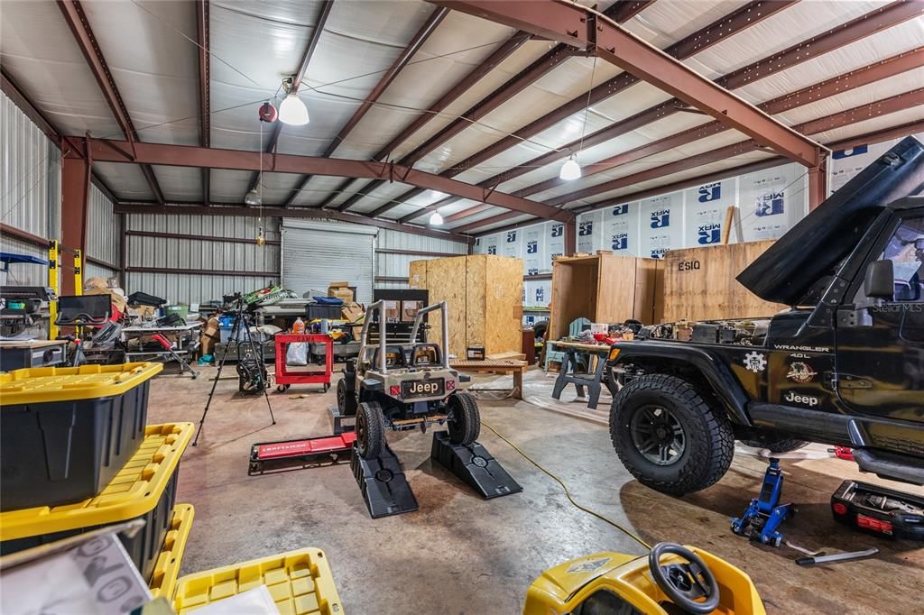 40x60 enclosed workshop with 2 roll-up doors; also plumbed for an air compressor