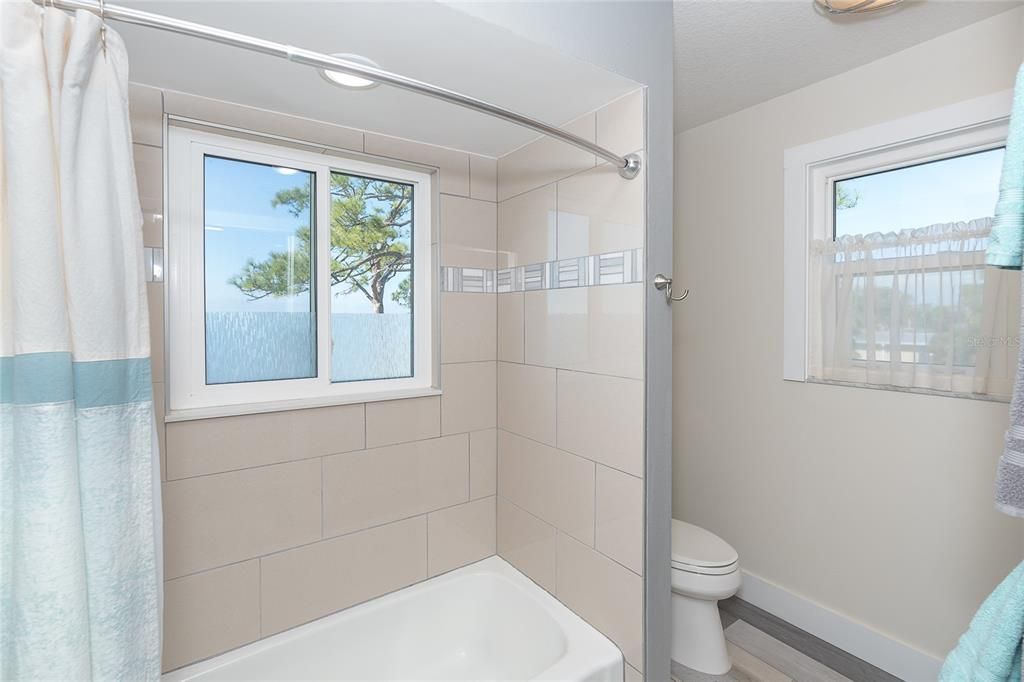 Studio  bathroom even has views from the shower.