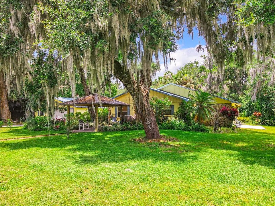 This could be your paradise with almost an acre of land, 200’ of canal frontage, no back yard neighbors, NO HOA and NO DEED RESTRICTIONS.