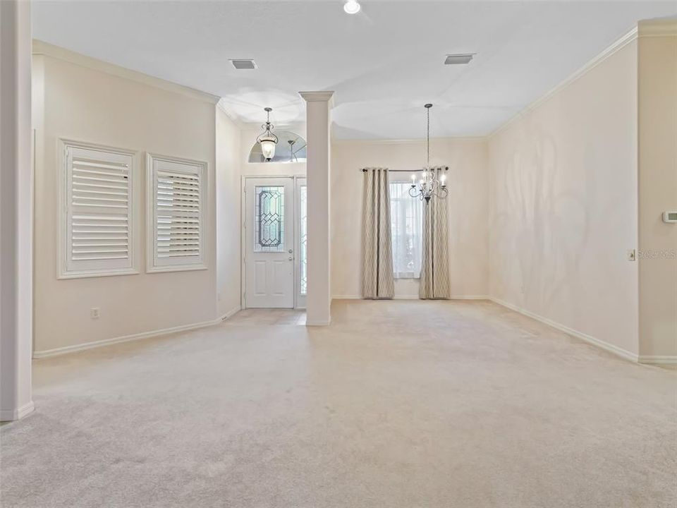 Front Door and Dining Room