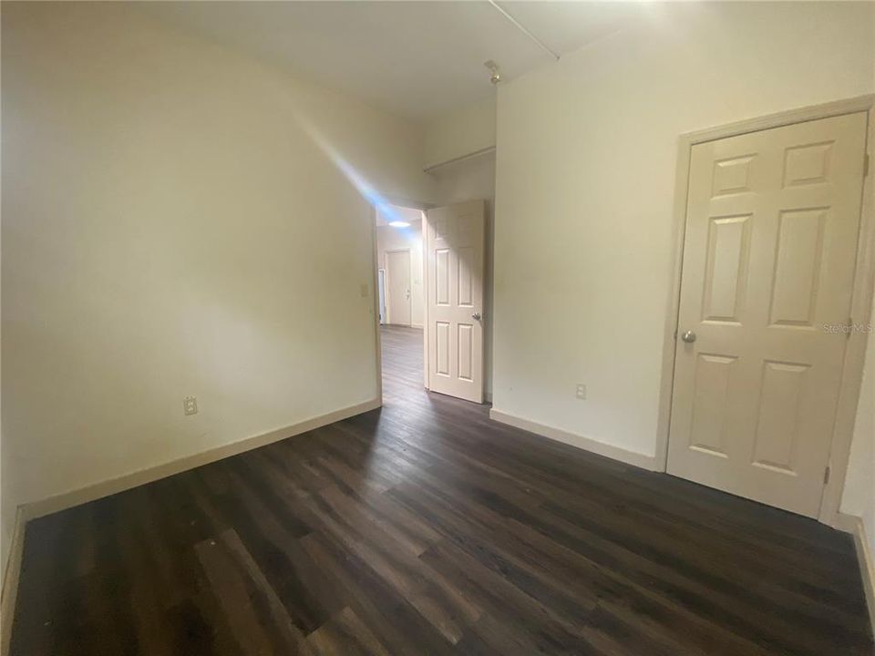 Front bedroom is 10'6 x 11' with the bedroom door opening to the living room.