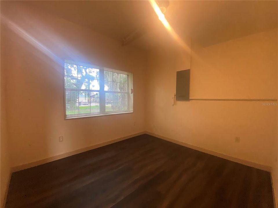 Back bedroom door opens the dining room.