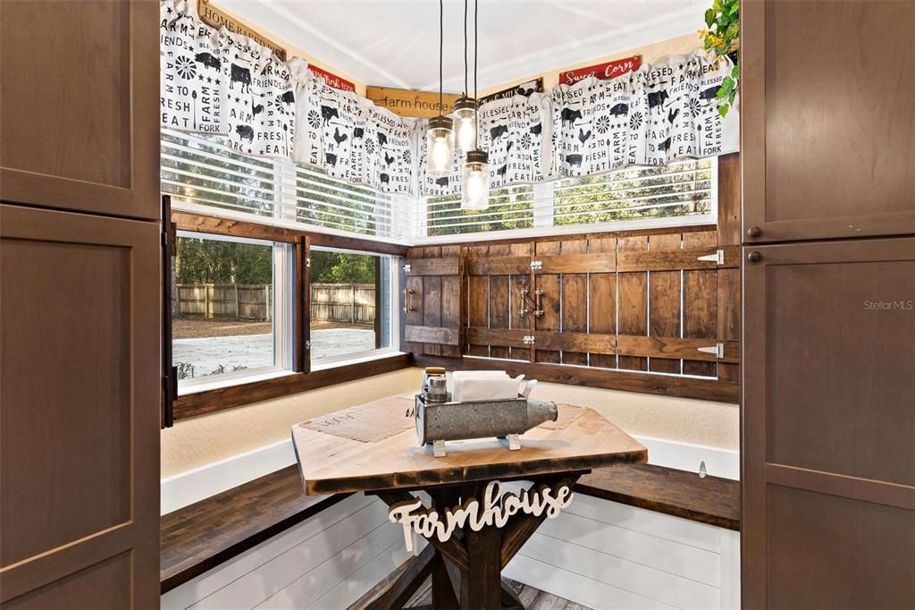 Kitchen with Corner Table with Built-in Storage in the Benches