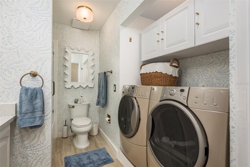 Totally remodeled Primary bathroom- the washer and dryer were in a closet, this was all opened up and incorporated into the bathroom-it allowed for a full size W/D