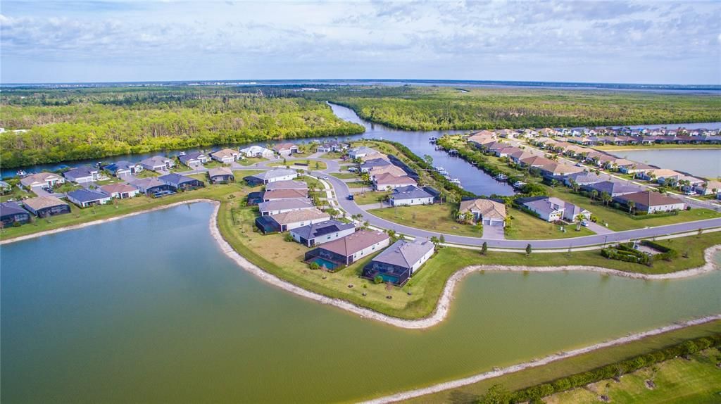 Harbor West Executive Homes over lake