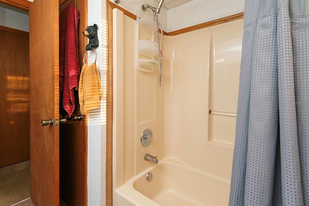 The second bath has a tub shower combination, and easy to care for!
