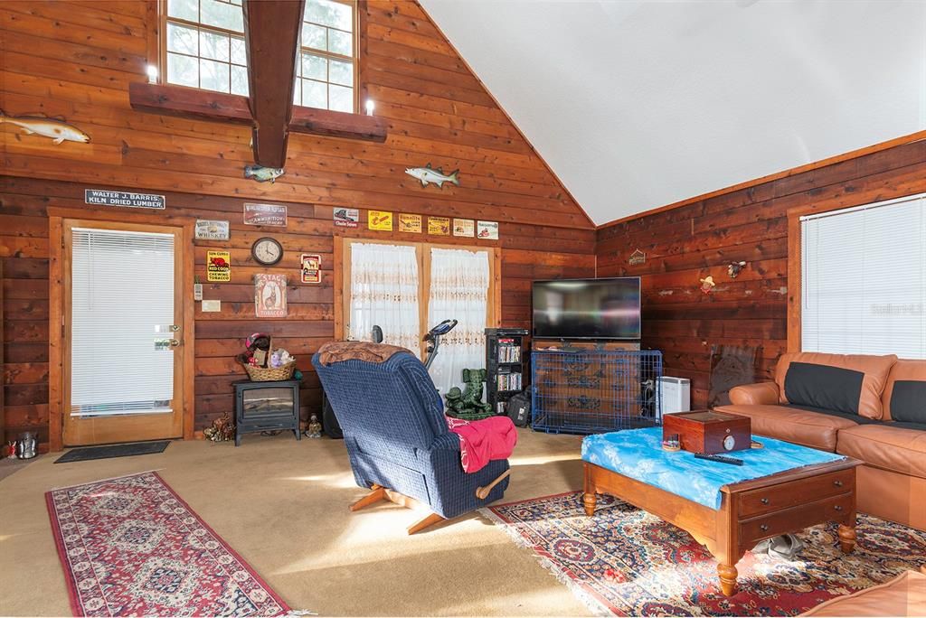 The front door enters into the living room with soaring ceilings!