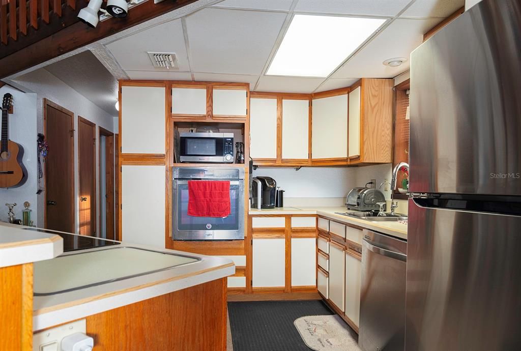 The kitchen also has a large walk-in pantry closet and nice view to the backyard.