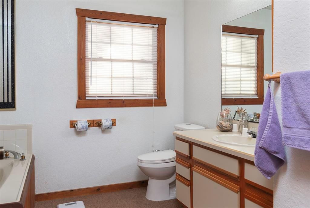 The master bath has a tub and separate shower.