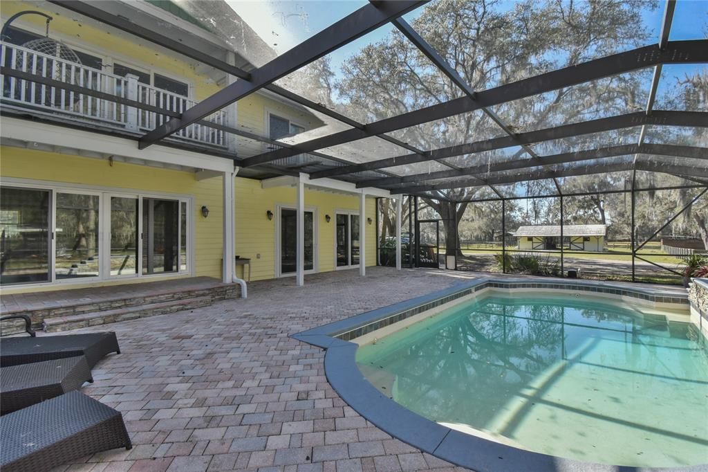 patio to pool has multiple entrances from house