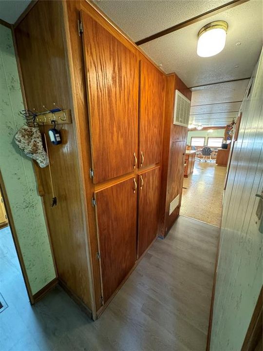 Custom Built-in Oak Cabinets in Hallway