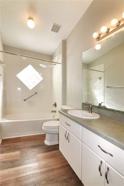 Guest bathroom with tub/shower combo