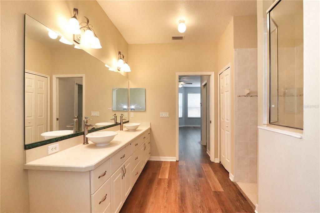 Dual sink vanity and linen closet