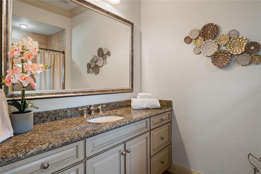 Powder Bath off the game room and pool area