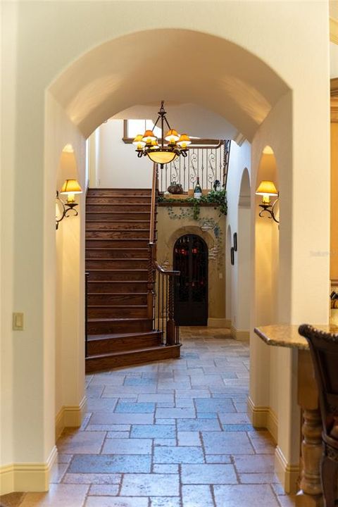 formal Staircase leading to mid level and second story living spaces