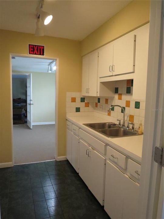 Kitchen looking into entry of Room 3