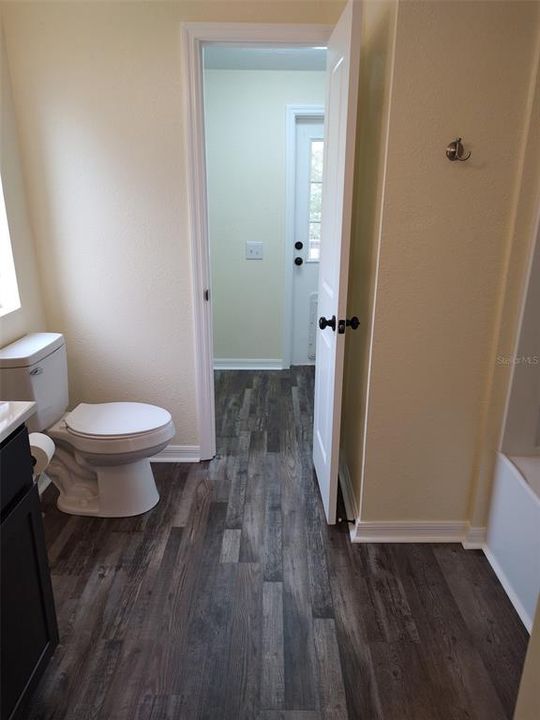 Master bath opens to laundry room